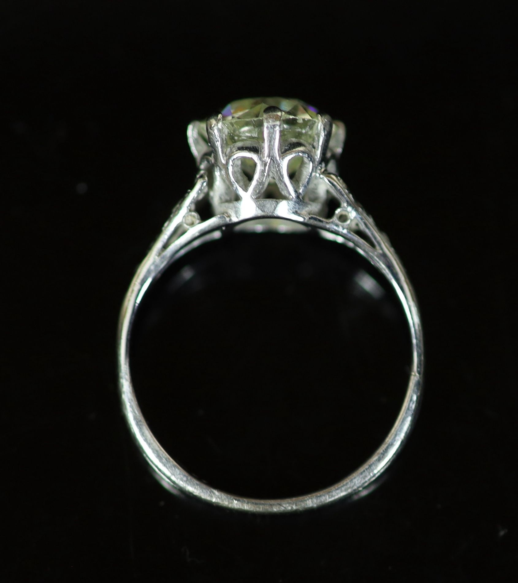 A 20th century 18ct white gold and platinum set single stone diamond ring, with diamond set shoulders